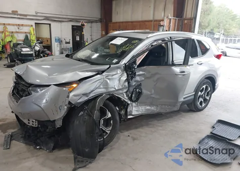2018 Honda Cr-V Touring z USA, uszkodzony, nr VIN 2HKRW2H9XJH634943